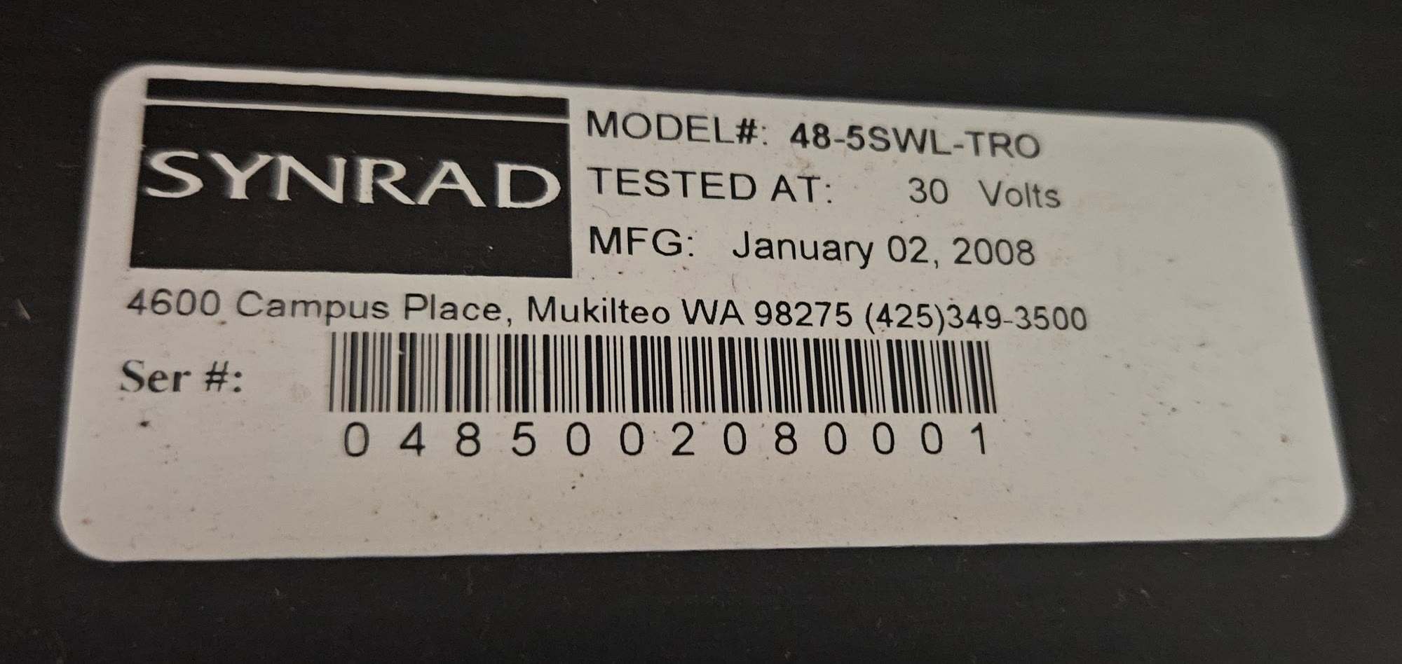 Synrad label reading Model 48-5SWL-TRO, tested at 30 volts, manufactured January 02 2008, serial 0485002080001